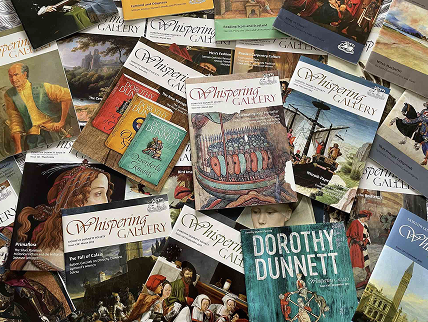 A pile of whispering gallery publications, stacked loosely on top of each other